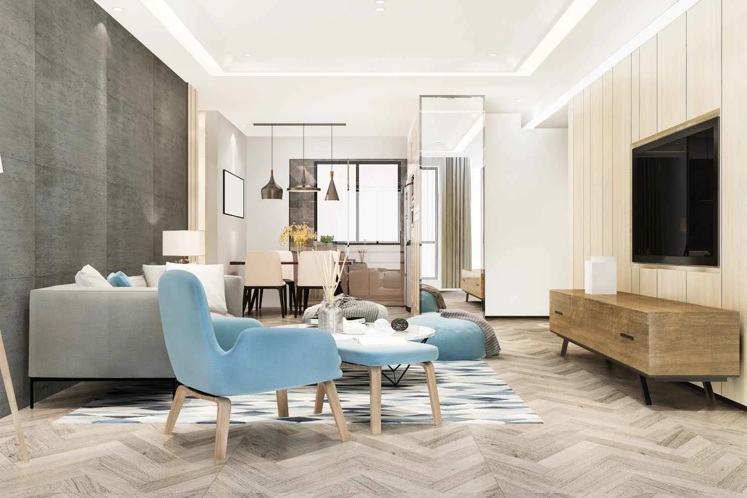 Living room with seating and an open kitchen behind it